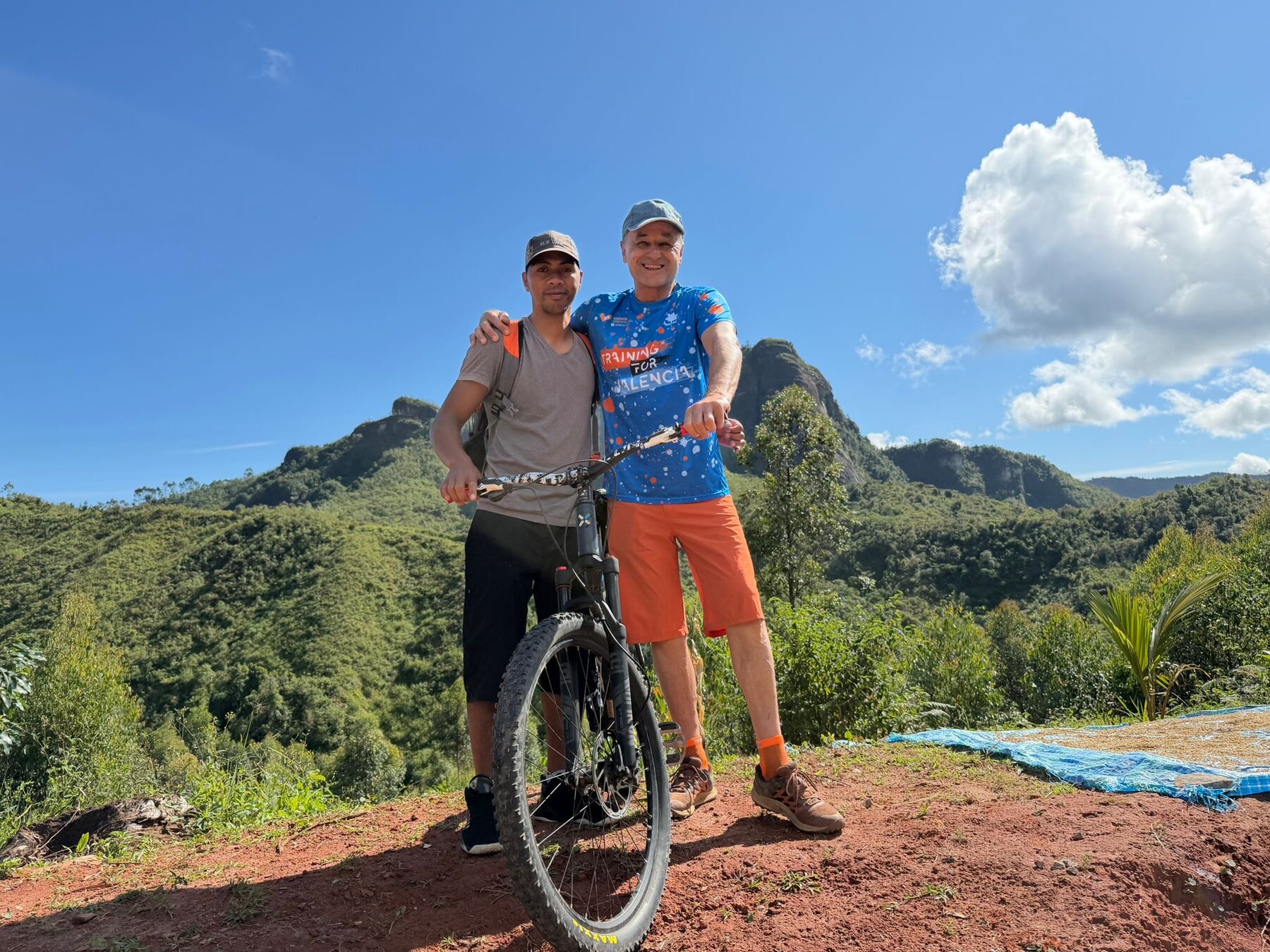 Cyclists overlooking the mountains of northern Madagascar